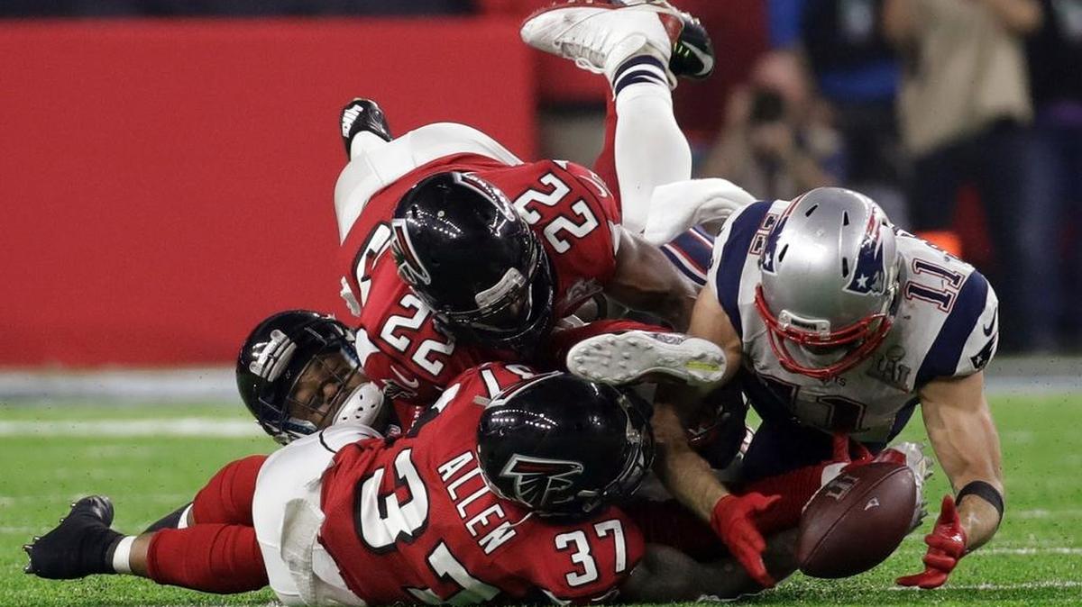 Julian Edelman, right, finished with five catches for 87 yards, none more impactful than the 23 he gained on this grab.