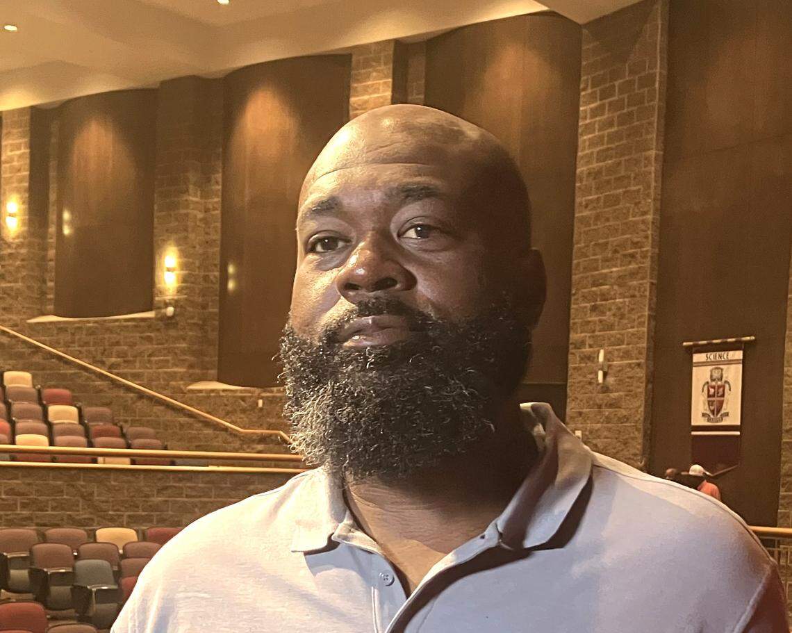 Carver High School athletics director Anson Hundley, who also is Carver’s head girls basketball coach, speaks to reporters May 25, 2025, in the school auditorium, where Jarvis Jones was announced as the football program’s new head coach.