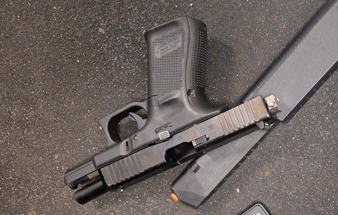 One of the guns seized April 29, 2024, by Columbus police at the Budgetel Inn and Suites. The gun has a silver switch attached.