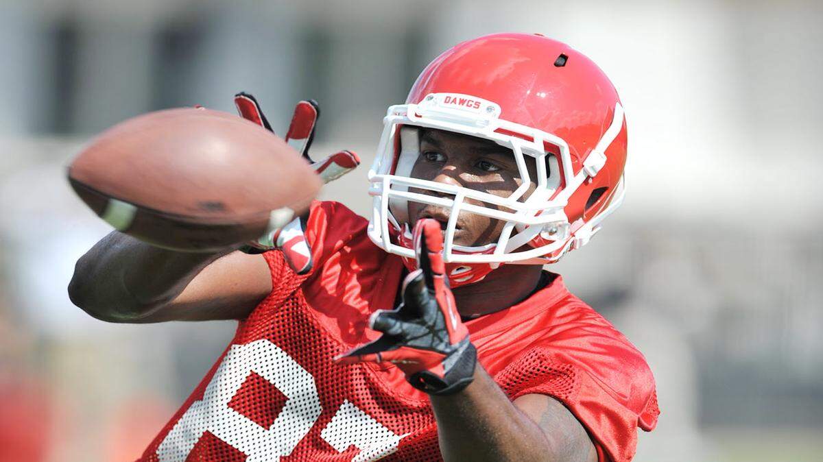 DONN RODENROTH/SPECIAL TO THE TELEGRAPH 
 Athens, Georgia, 08/0 1/2013: Georgia tight end Jay Rome hauls in an Aaron Murray pass during the Bulldogs first practice.