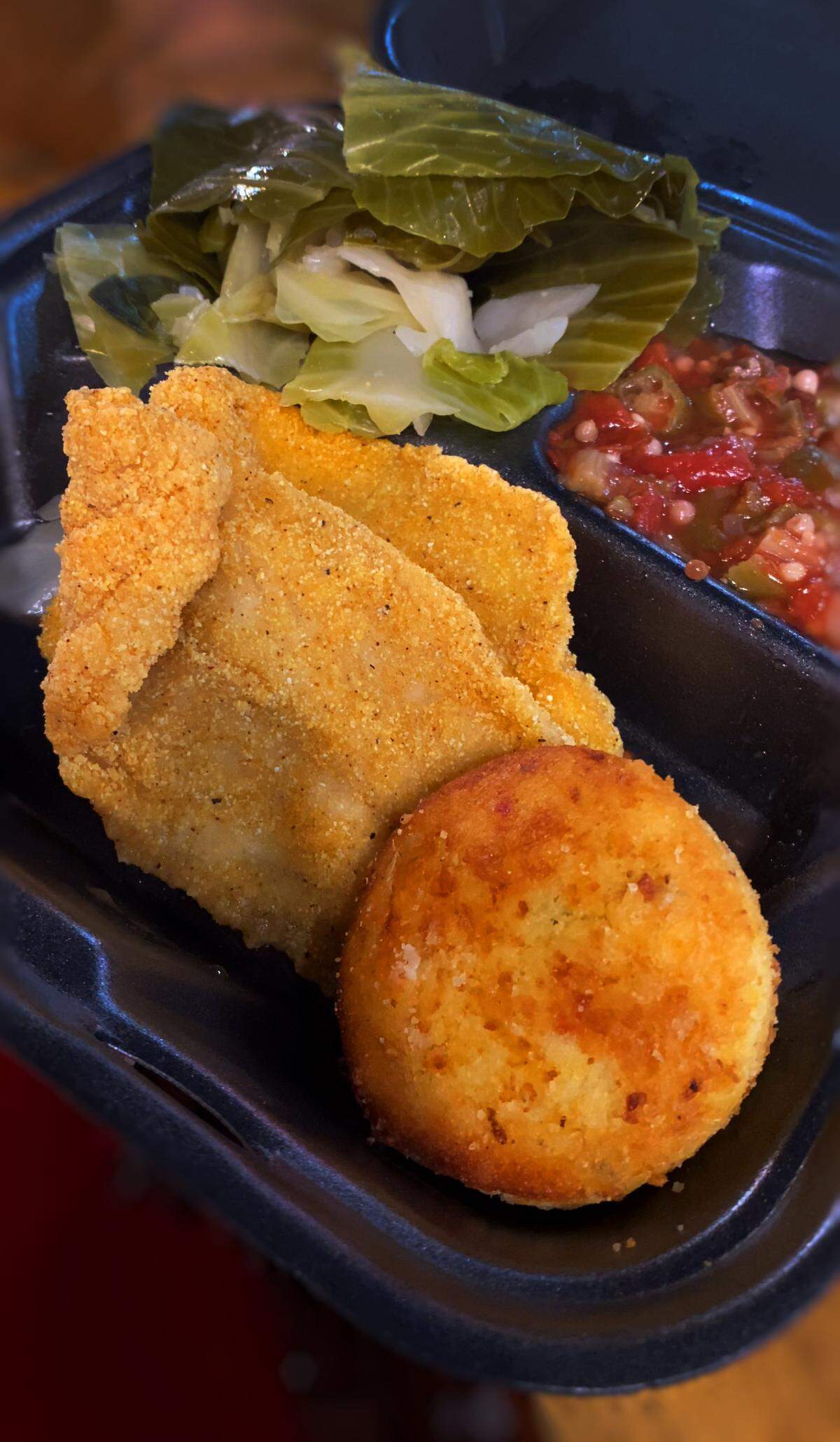 Ledger-Enquirer visual journalist Mike Haskey recently grabbed lunch at the ​deli inside the Piggly Wiggly on 13th Street in Columbus. He ordered fried fish, cabbage, cornbread and okra with tomatoes.