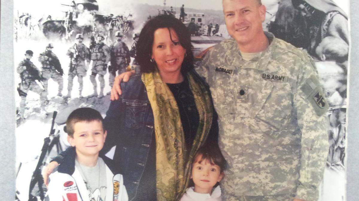 A photo of Tammy and David McCracken and two of their children. Tammy told the Ledger-Enquirer that David died in 2011. She said she supports a new bill that would allow spouses of dead military service members to keep certain  Department of Veterans Affairs and Department of Defense benefits if they remarry.