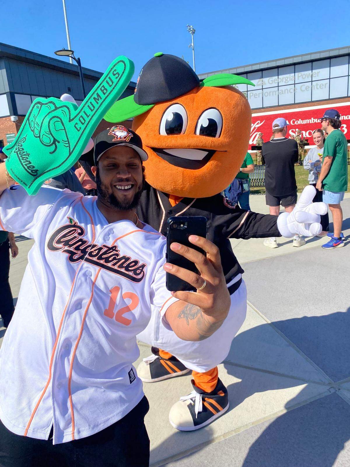 Fuzzy, the Columbus Clingstones mascot, works the crowd before the Clingstones’ first-ever home game on April 15, 2025. The Clingstones were set to take on the Pensacola Blue Wahoos.