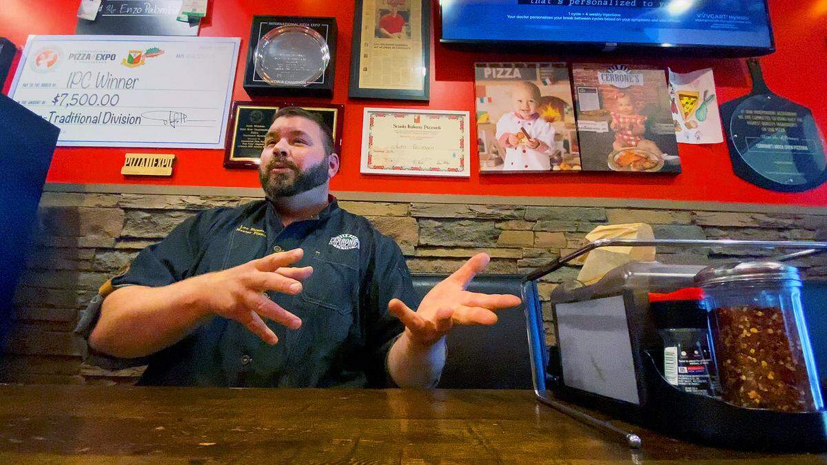 Leo Dicesaris, owner of Cerrone’s Brick Oven Pizzeria in Columbus, talks about the pizza he crafted to win the non-traditional pizza division at the 2025 International Pizza Challenge. in Las Vegas, Nevada.