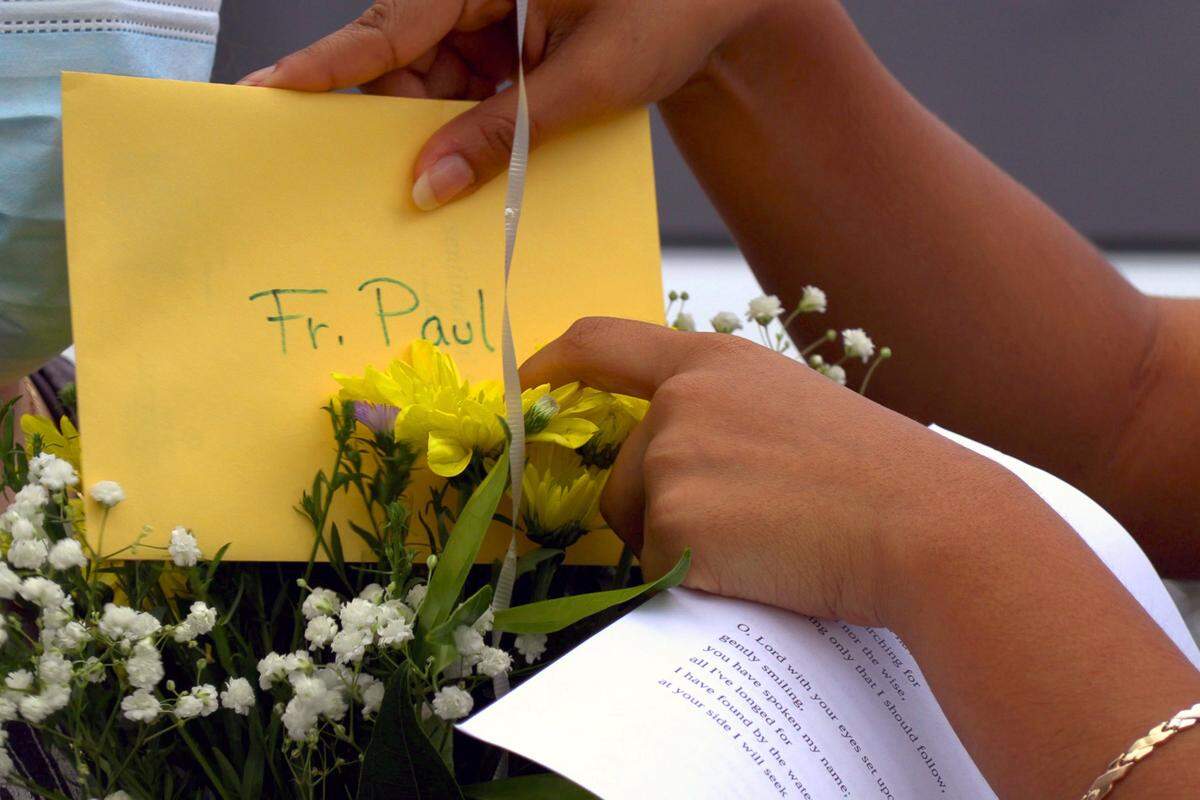 Parishioners from Our Lady of Lourdes catholic church surprised four friars quarantined inside the friary at St. Anne Catholic Church in Columbus, Georgia on Monday, offering prayers for their speedy recovery, floral bouquets, and a musical serenade.