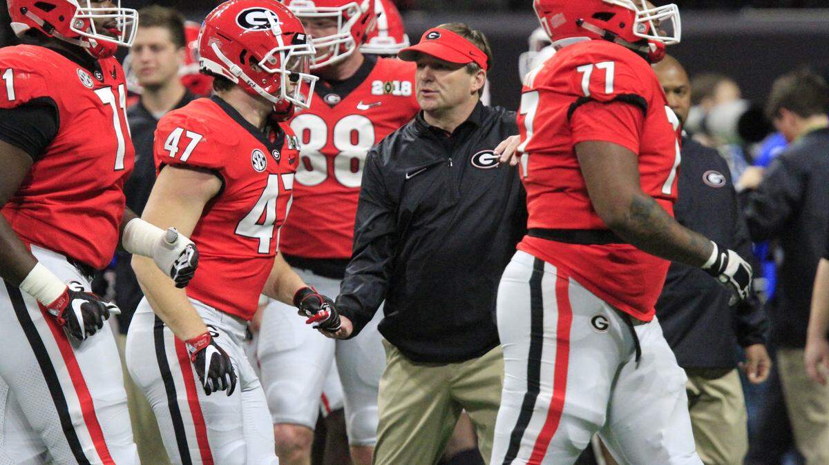 Georgia head coach Kirby Smart walks the field before the College Football Playoff National Championship game in Atlanta. The Crimson Tide went on to beat the Bulldogs 26-23 in overtime to win the title.