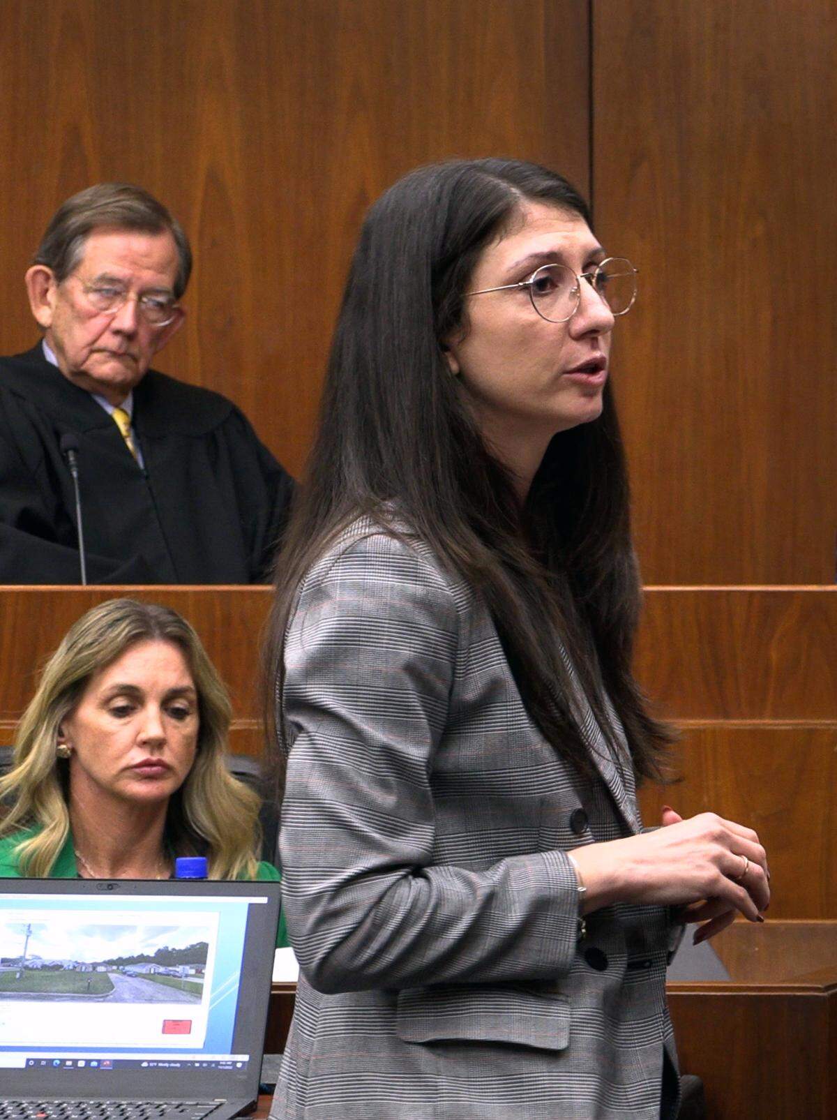 Assistant District Attorney Veronica Hansis, right, makes her opening statement Tuesday morning at the trial of Cyrus Howard Sr. 11/01/2022