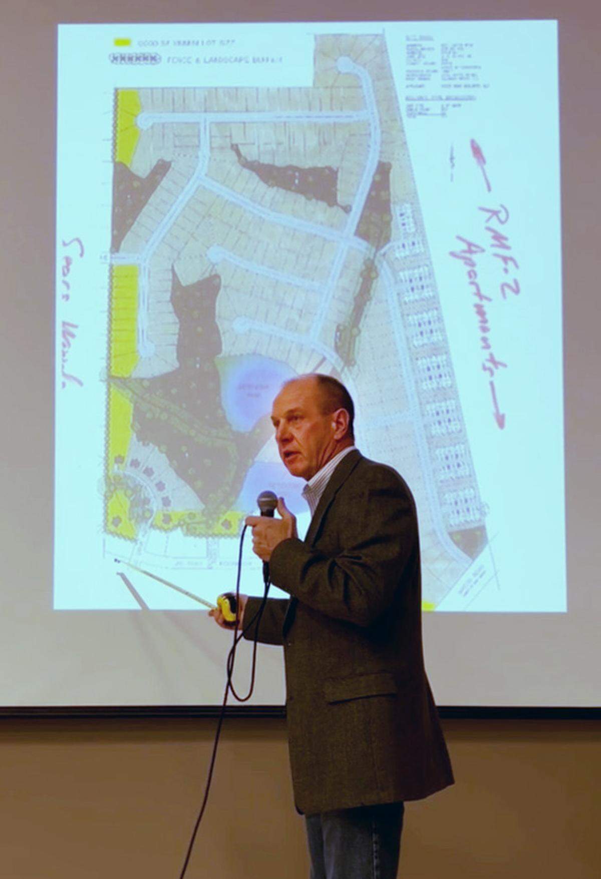 Dave Erickson, advisor and general contractor for or Wizer Home Builders, speaks during a town hall meeting with local residents on Nov. 12 at Wynnton Methodist Church about the company’s request to rezone the property at 5201 Macon Rd. in Columbus, Georgia.