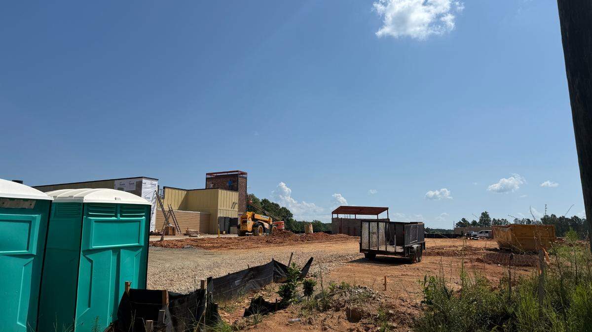Raising Cane’s, a Plano, Texas-based fried chicken restaurant, and Jim ‘N Nicks, a barbecue chain based in Birmingham, Alabama, are joining the Sons Chevrolet dealership development being built at Columbus Park Crossing, shown June 24, 2025.