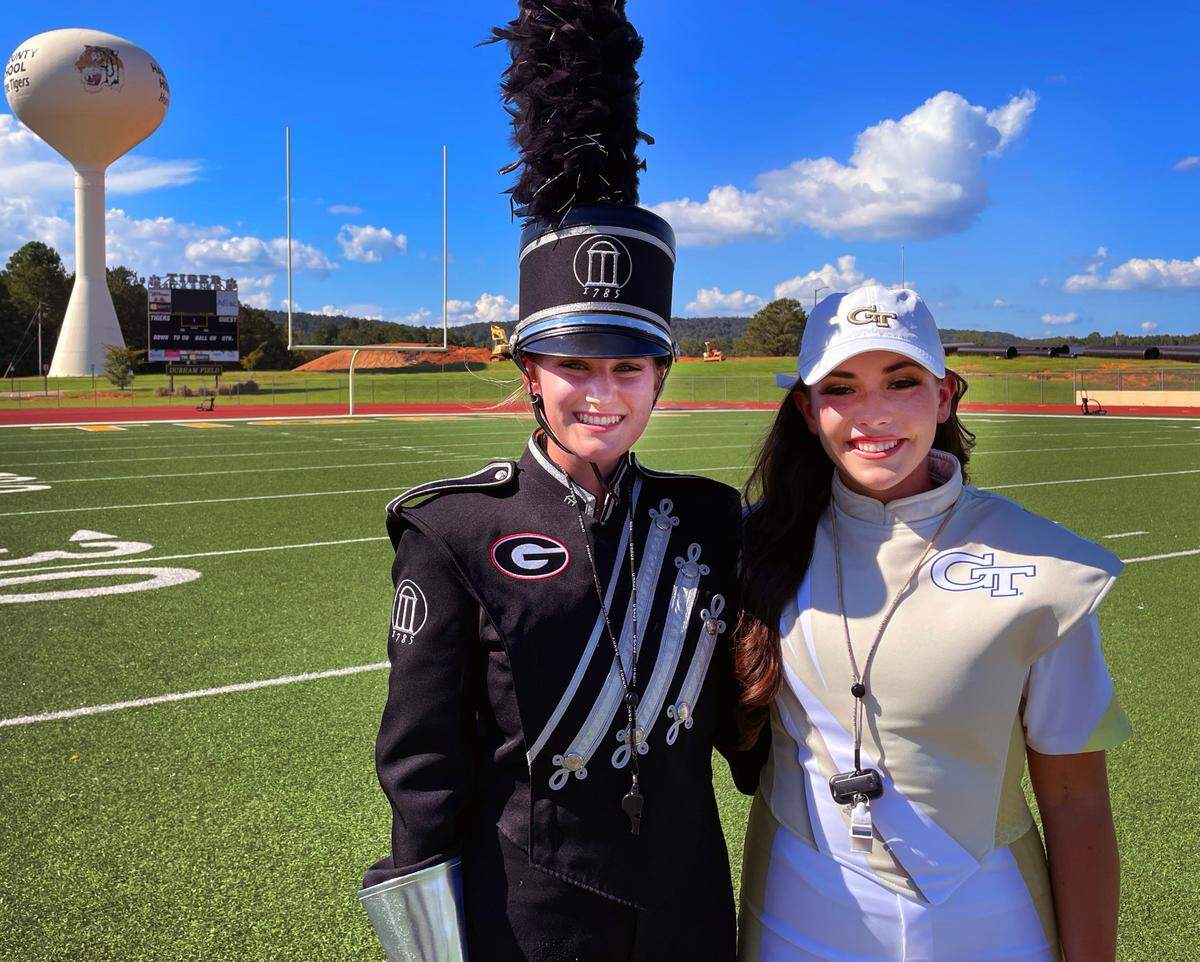 University of Georgia drum major Hannah Marston, left, and Georgia Tech drum major Kaleigh Griswell are Harris County High School graduates. They returned to HCHS for a photo session Aug. 28, 2022, celebrating their success.
