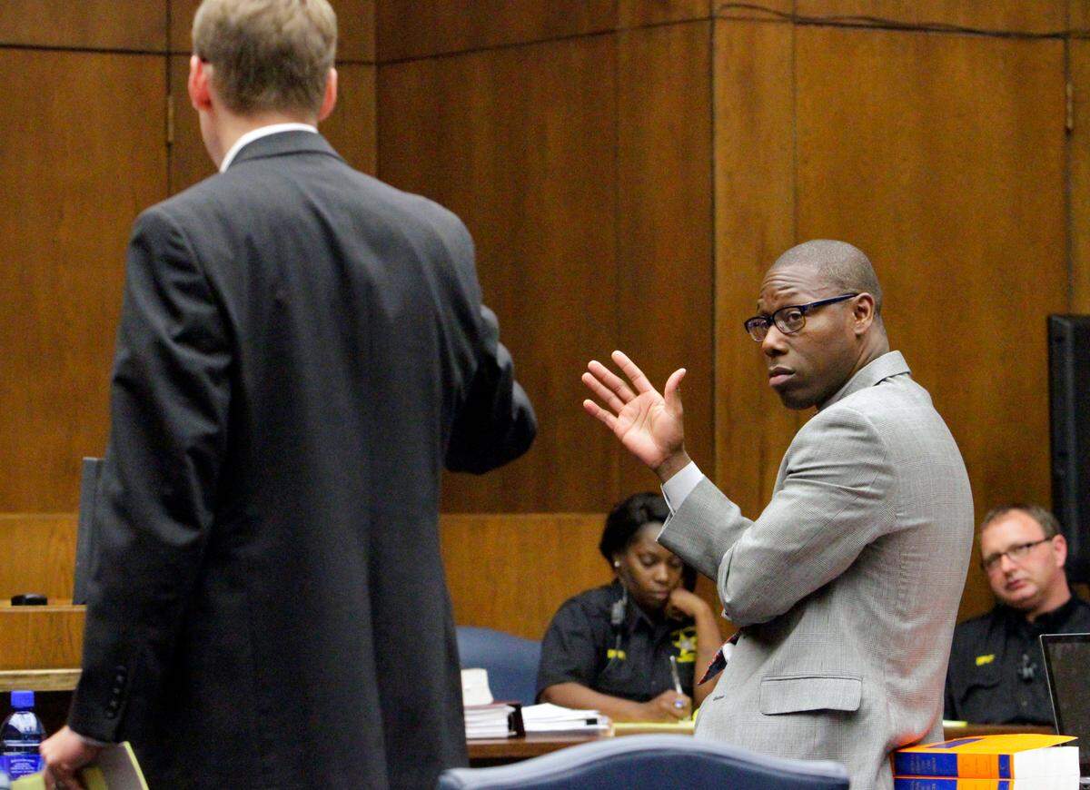 Assistant District Attorney Wesley Lambertus, left, and defense attorney Stacey Jackson make their points to Judge Art Smith III during testimony in Superior Court October 2, 2015. Jackson’s client Priscilla Morgan faces several charges, including malice murder and felony murder in the May 2014 stabbing death of her boyfriend Anthony Tirrell Murray following an argument at a party.