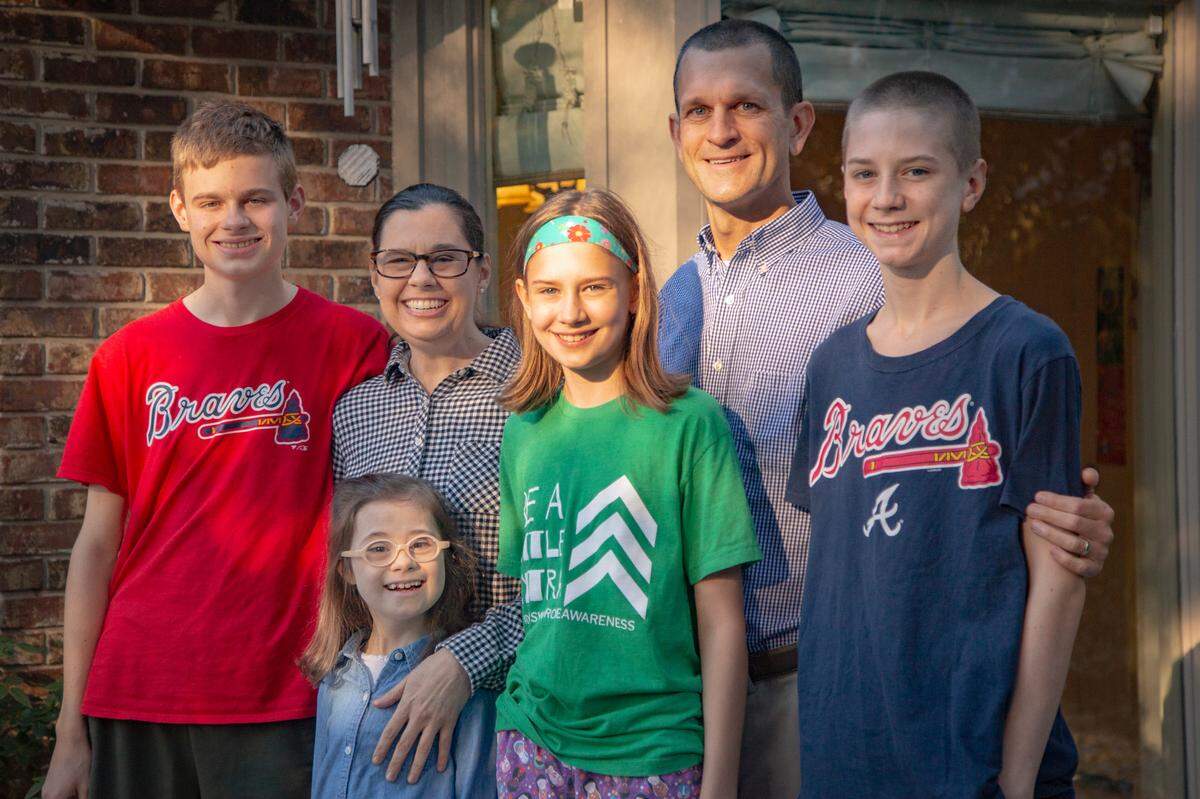 Jacob, Ellie, Michelle, Julia, Jeff and Xavier Chardos in their backyard in Columbus, Ga. on Nov. 2, 2021. The release of a pediatric vaccine signals an end to the family’s strict quarantine since the COVID-19 pandemic began.