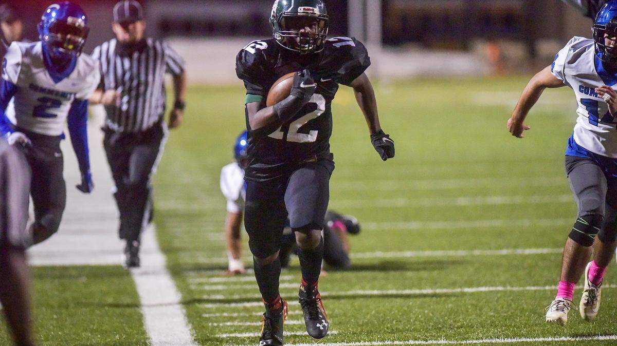 Calvary’s Jahkobe Coleman stays in bounds for a 31-yard catch and run into the endzone against Community in the 1st quarter of the game Friday night at Kennett Stadium, October 30, 2020