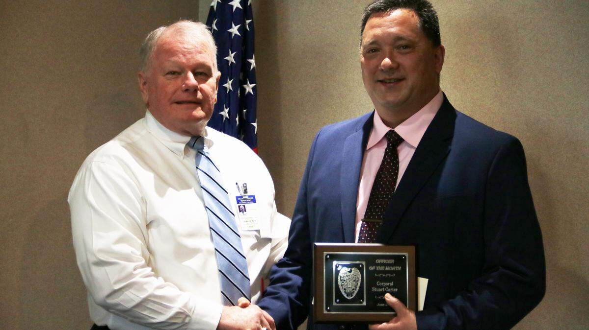 Police Chief Ricky Boren, at left, with Cpl. Stuart Carter \