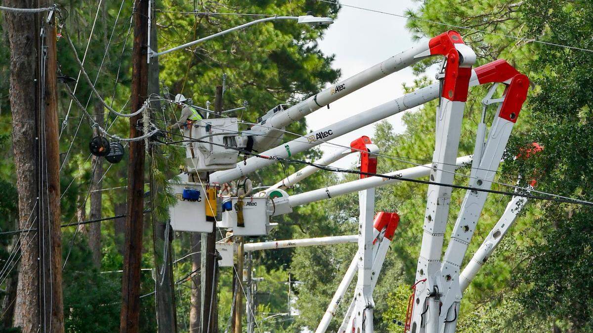 Electrical crews work to restore power in Valdosta after Hurricane Idalia. Federal authorities warn of more power failures this year.