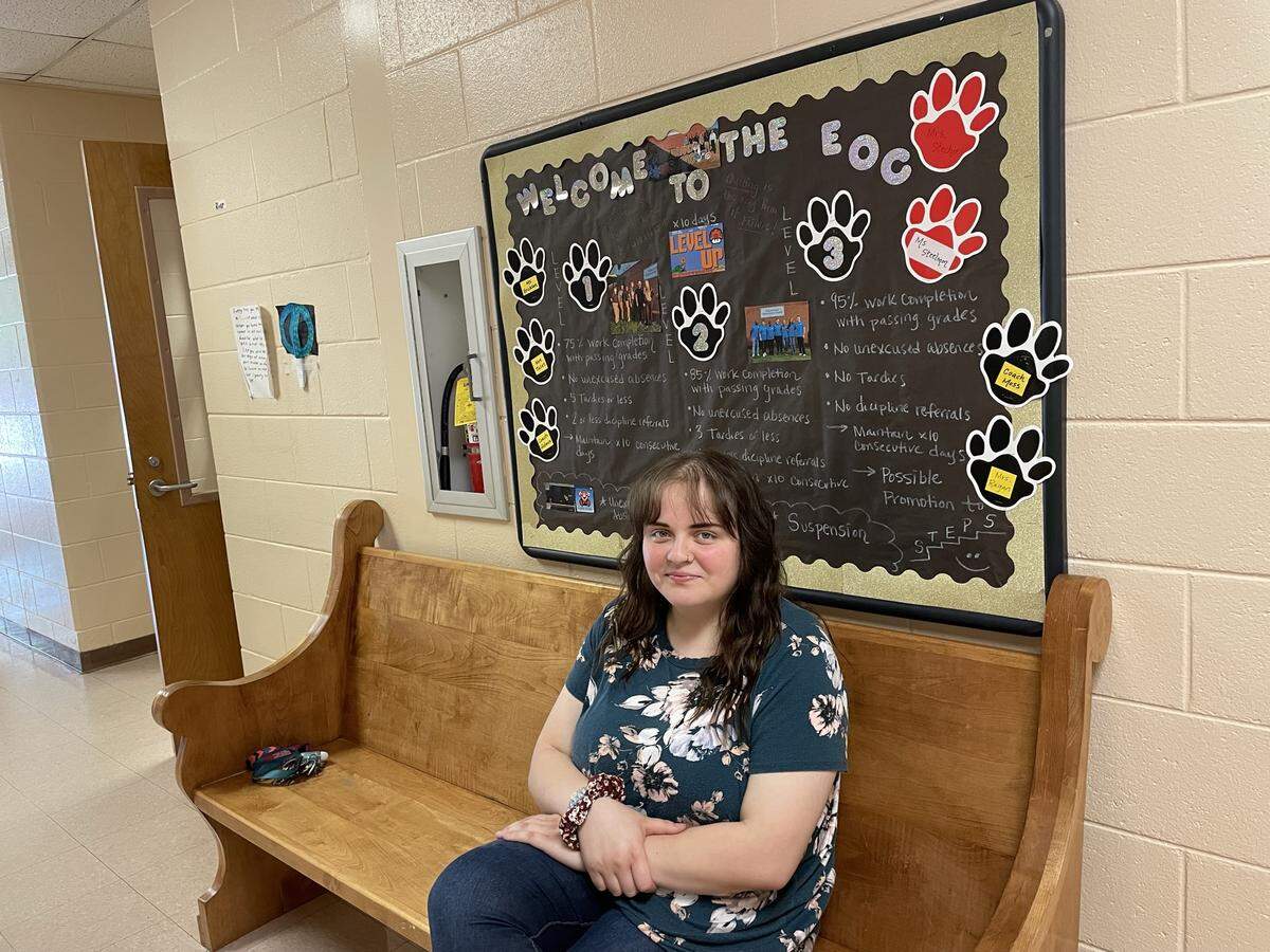 Kellie Finnegan sits on the church pew outside the office of Ariane Stecher, administrator of the Educational Opportunity Center and STEPS program in the Harris County School District. This is where Kellie decided to rip up the letter containing the request for money from her incarcerated father.