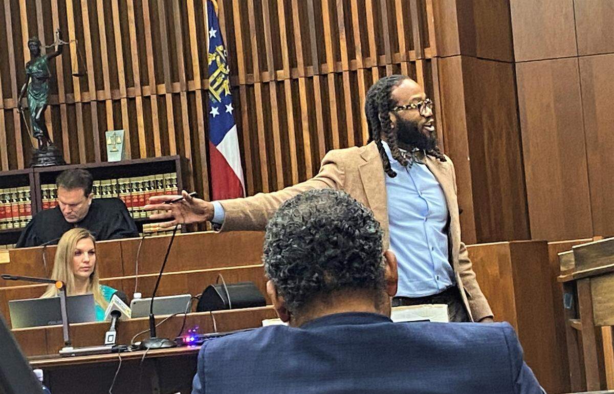Defense attorney William Kendrick makes a point during closing arguments.