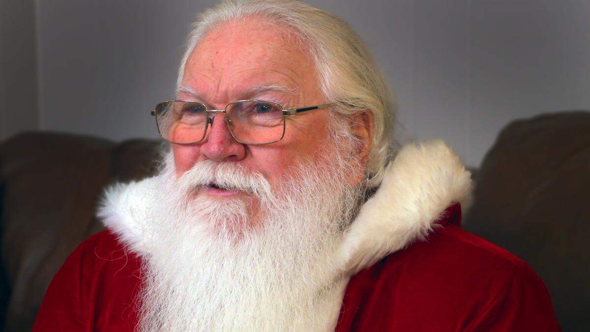 Stephen Coggins portrayed Santa Claus at a Dec. 15, 2024, holiday party for the Down Syndrome Association of Greater Columbus.