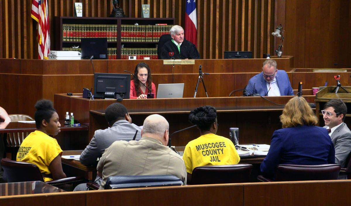 Defense attorneys for Ceonna Shikeria Turpin, seated third from right, and Eurica Denise Turpin, seated far left, asked Judge Bobby Peters to rule their clients are immune from prosecution under Georgia law in the death of Mar’kayla Marshall. 01/27/2023