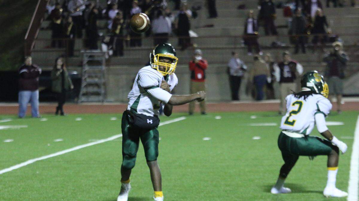 DAVID MITCHELL/dmitchell@ledger-enquirer.com
Spencer quarterback Khalil Thomas throws a pass Friday.