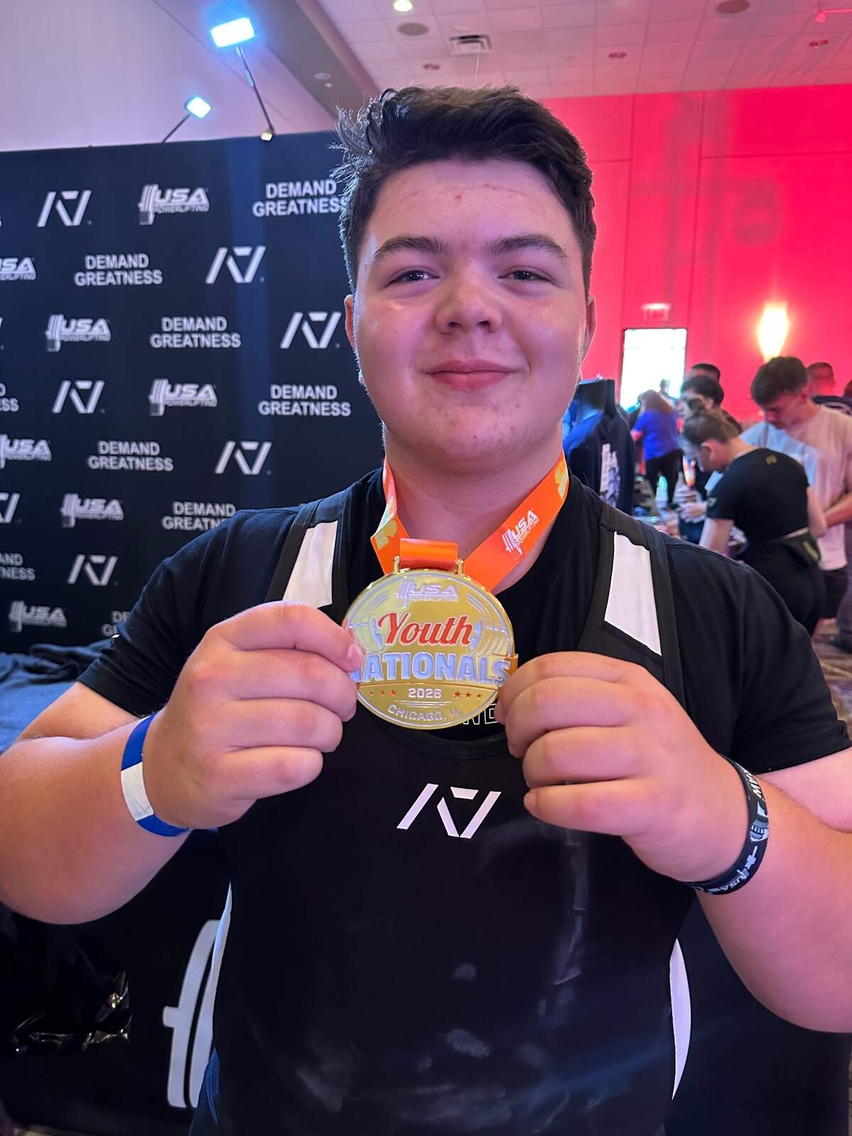 Nash Earwood celebrates after winning first place at the USA Powerlifting Youth Nationals in Lombard, Illinois, on June 12, 2026.