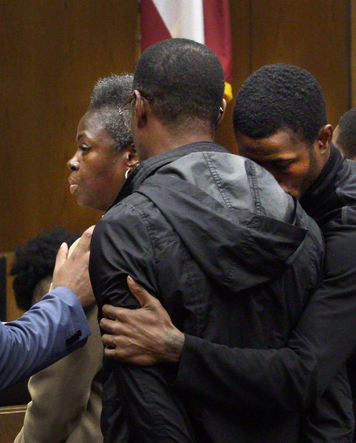 Darnel Lamar Piett, right, and his parents appear before Judge Maureen Gottfried for a plea hearing Friday morning in Columbus, Georgia.