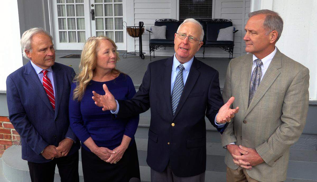 From left, Greg Moore, Cecile Moore Rainey, Steve Moore, and Dave Moore answer questions about their parents, Hal and Julia Compton Moore, during a recent visit to Fort Benning, Georgia. 02/17/2023