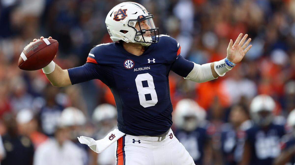 FILE - In this Sept. 20, 2017, file photo, Auburn quarterback Jarrett Stidham (8) throws a pass against Mississippi State during the first half of an NCAA college football game, in Auburn, Ala.