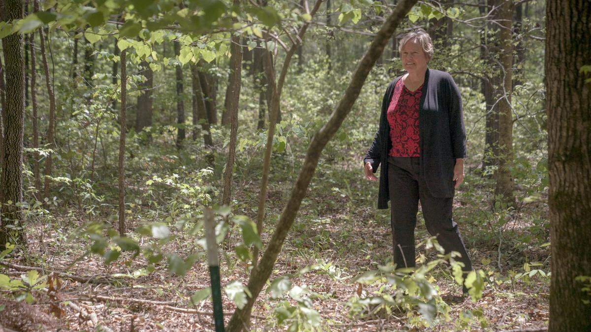 Jeanette tk walking through the Whispering Hills Memorial Nature Preserve on April 19, 2021 in LaGrange, Ga. tk has chosen to be buried there.