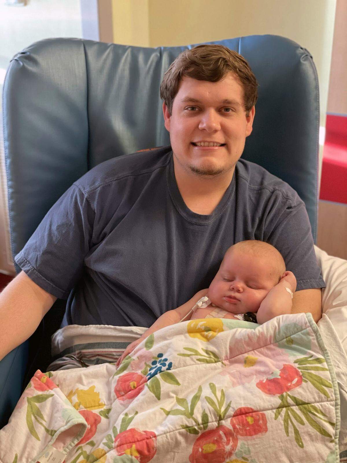 Jeremy Head holds his daughter Ansley.