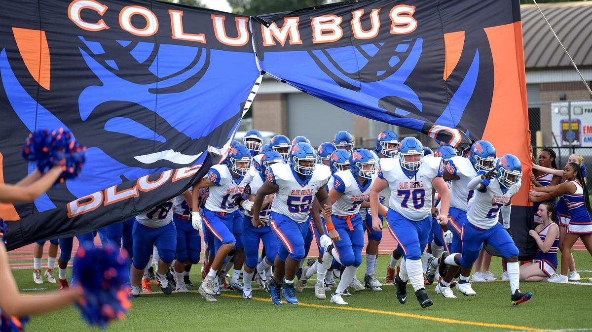 The Columbus High School Blue Devils enter the at Kinnett Stadium Friday for their football game against Northside High School. 08/19/2022