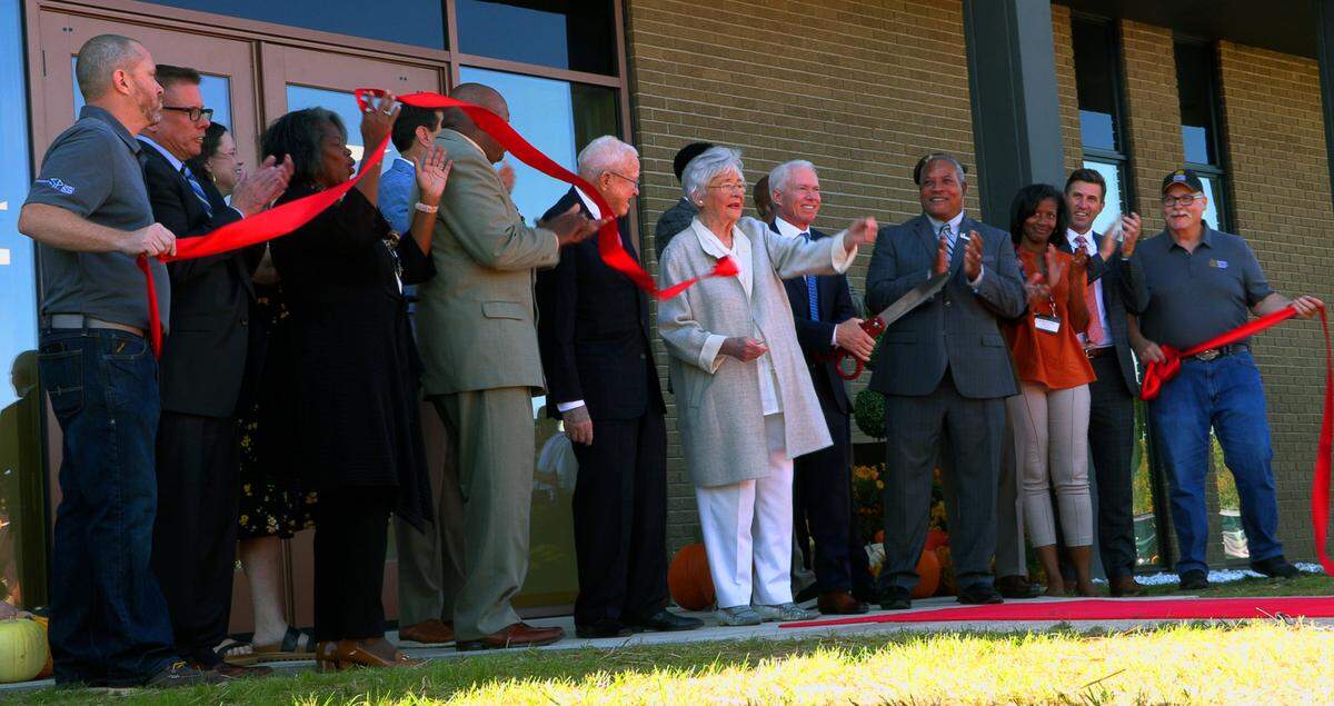 Alabama Governor Kay Ivey, center, cuts the ribbon for Sierra Pacific Windows’ newest location in Phenix City, Alabama. 10/22/2024