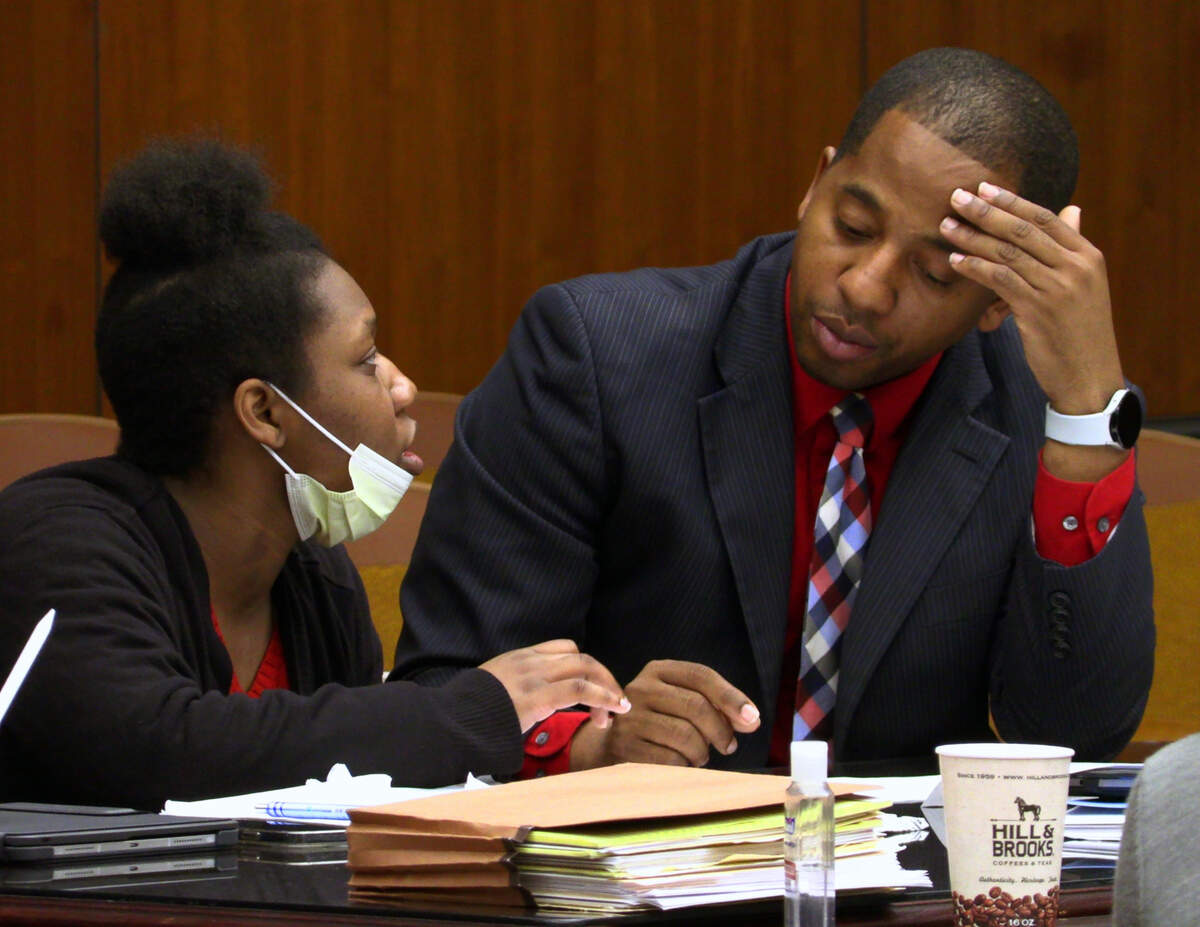 Eurica Denise Turpin, left, speaks with her defense attorney Anthony Johnson Tuesday morning. 02/07/2023