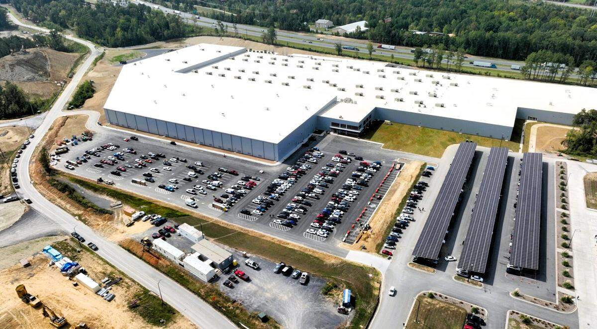 Overview of the Qcell factory near Dalton in Whitfield County. The plant was completed in 2023, and employed nearly 2,000 people. The project cites the IRA as pivotal for expansion from Cartersville.