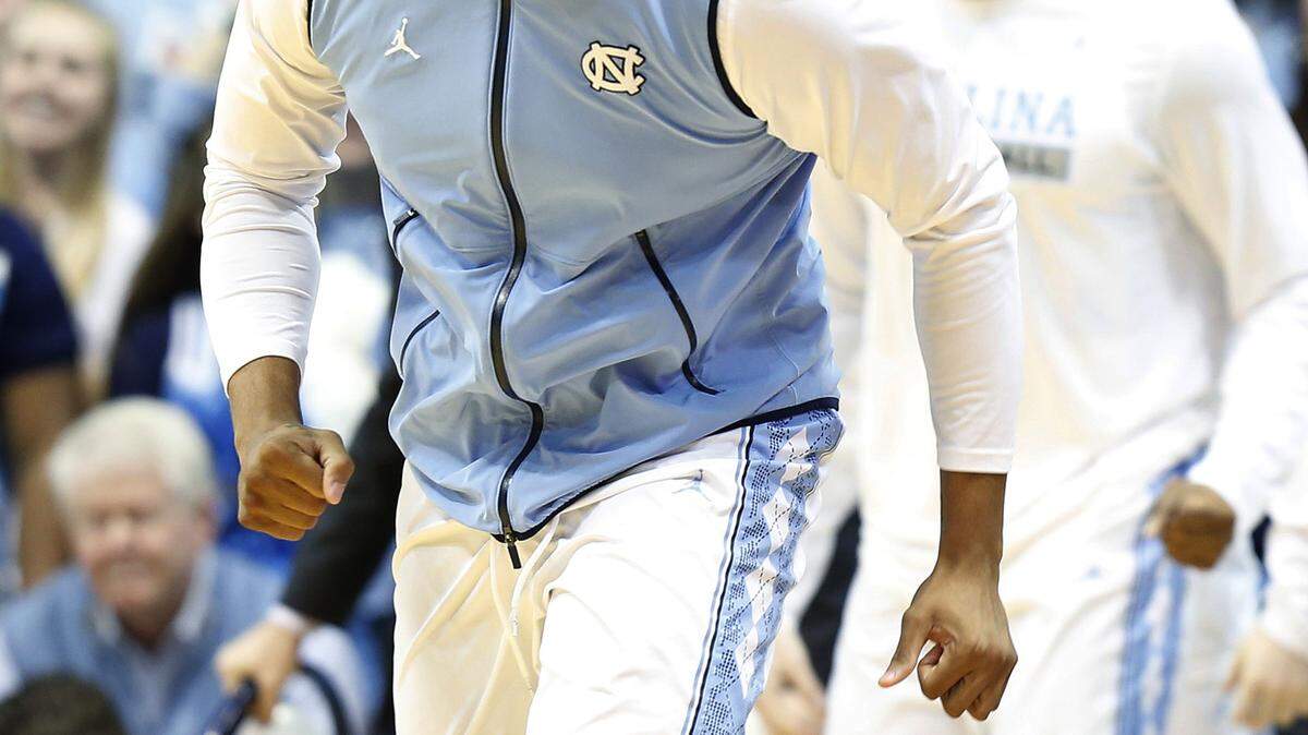 North Carolina's Kennedy Meeks reacts during the second half of an NCAA basketball game against Georgia Tech, Saturday, Jan. 2, 2016, in Chapel Hill, N.C. Meeks did not play in the game due to a knee injury. North Carolina won 86-78. (AP Photo/Ellen Ozier)