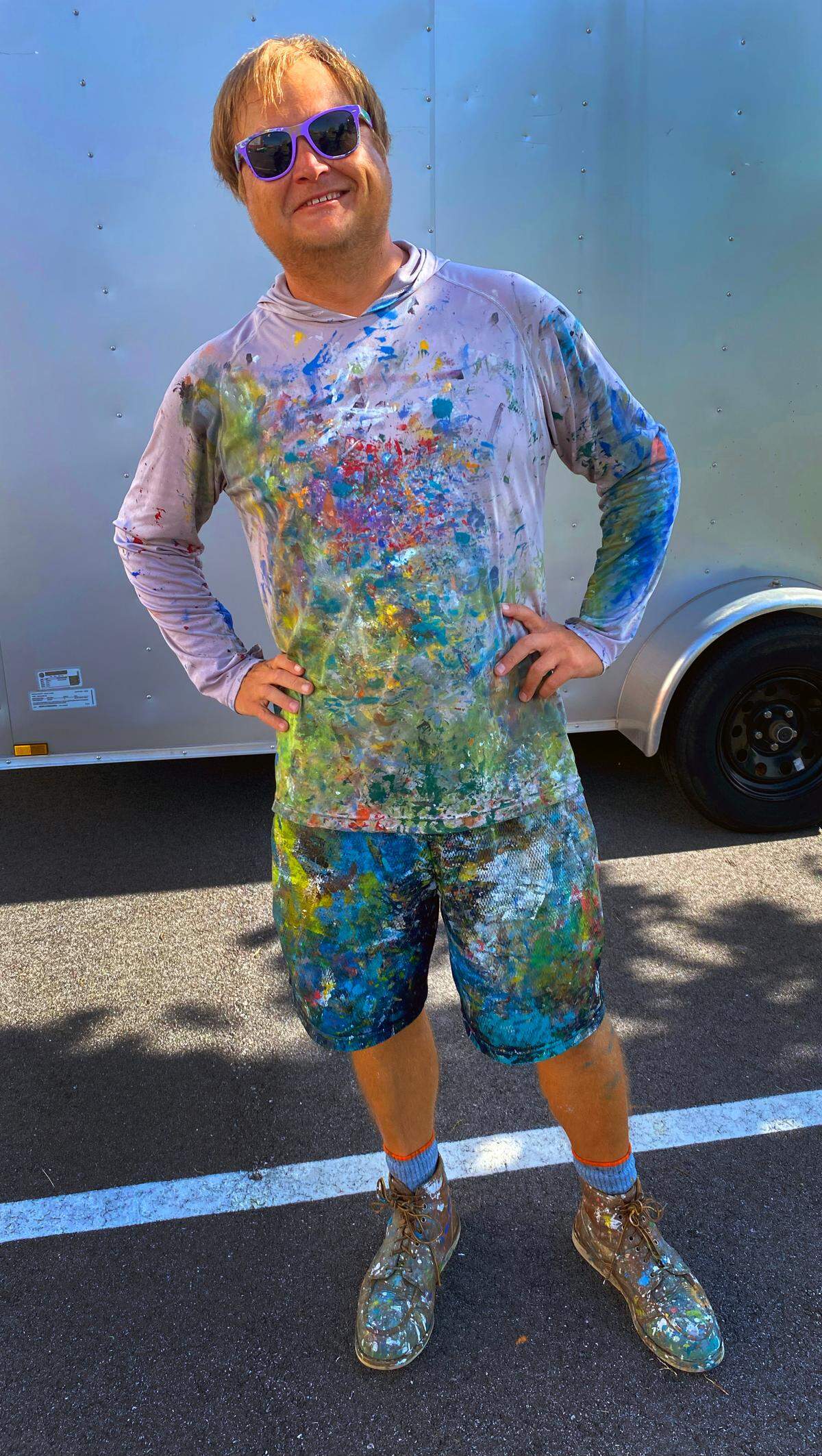 Artist Chris Johnson paints the new mural on Extra Space Storage at Cross Country Plaza in midtown Columbus on July 14, 2025.
