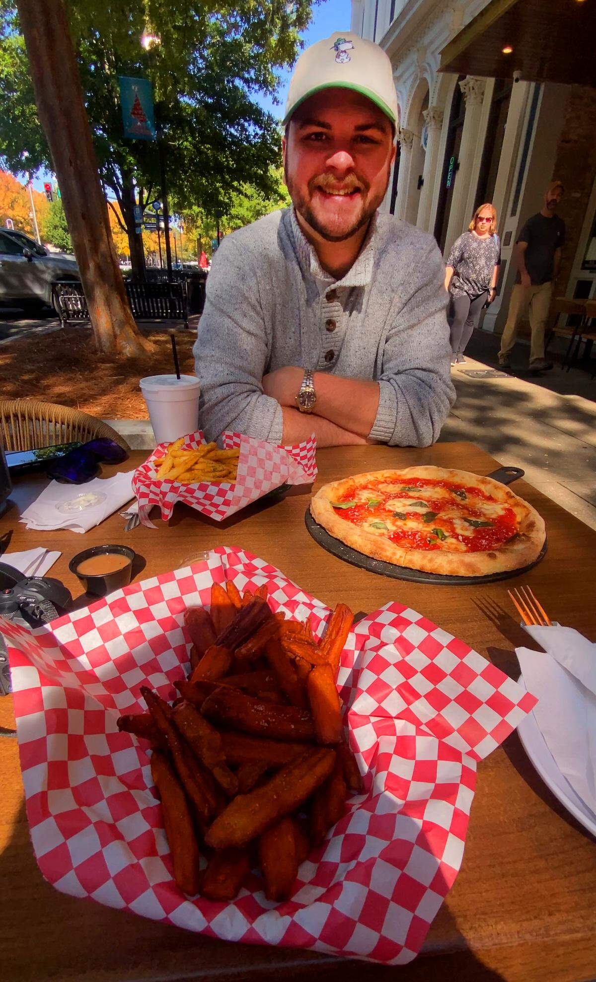 Ledger-Enquirer reporter Kelby Hutchison ordered dill fries, sweet potato fries and a Margherita pizza at The Mix Market in Columbus on Nov. 6, 2025.