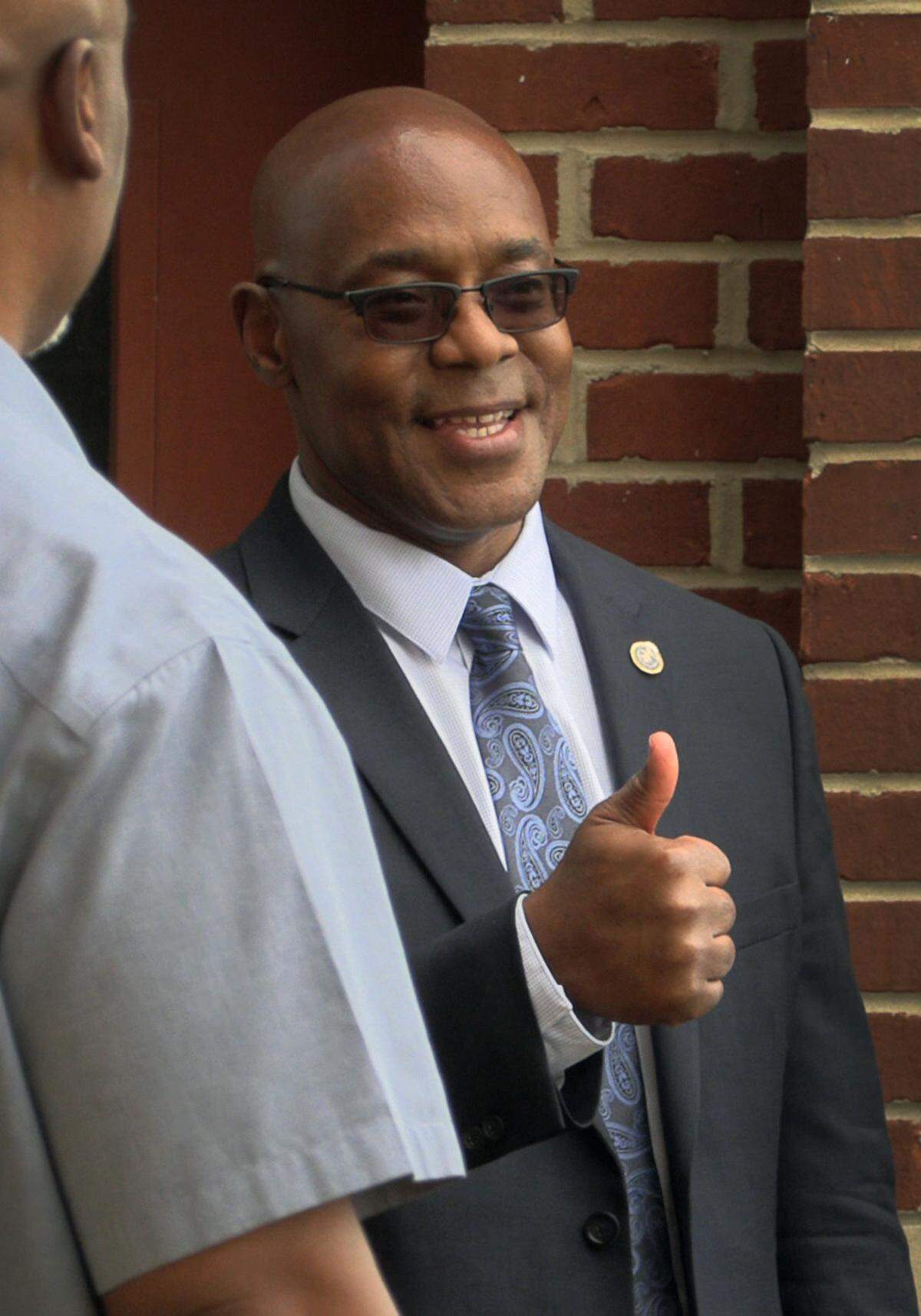 Columbus Police Chief Freddie Blackmon meets with supporters who attended the rally outside the City Services Center prior to Tuesday night’s Columbus Council meeting. 03/28/2023