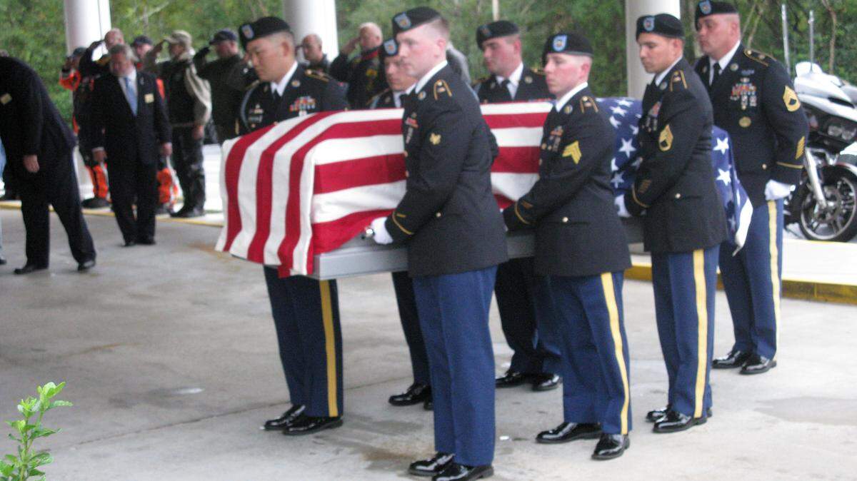 The remains of Sgt. 1st Class James S. Streetman Jr., who died in combat nearly seven decades ago during the Korean War, were returned to Columbus Thursday afternoon. Soldiers carry his casket into McMullen Funeral Home and Crematory on Gentian Boulevard. The soldier’s funeral will be Saturday. --
