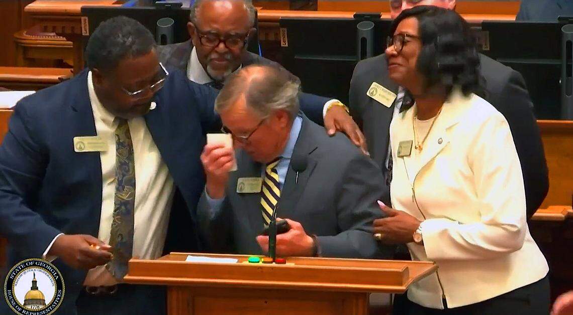 State Rep. Vance Smith (R-Pine Mountain), center, gives an emotional thank-you Tuesday in the Georgia House of Representatives. During the morning orders, Smith came to the podium on the House floor to express his gratitude to his family and colleagues for their support. “This is a family in here,” Smith said. “You won’t believe the calls and texts I’ve had. It’s amazing.”