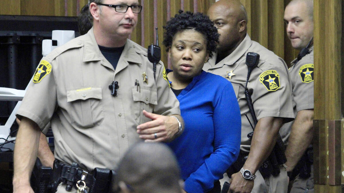 ROBIN TRIMARCHI rtrimarchi@ledger-enquirer.comPriscilla Morgan, center, is escorted into Superior Court Thursday to hear the verdict in her murder trial for the May 2014 stabbing death of her boyfriend Anthony Murray. The jury found Morgan not guilty of the malice murder and the felony murder charges, but found her guilty of aggravated assault. Sentencing is October 14 in Judge Art Smith III's courtroom.  10.08.15