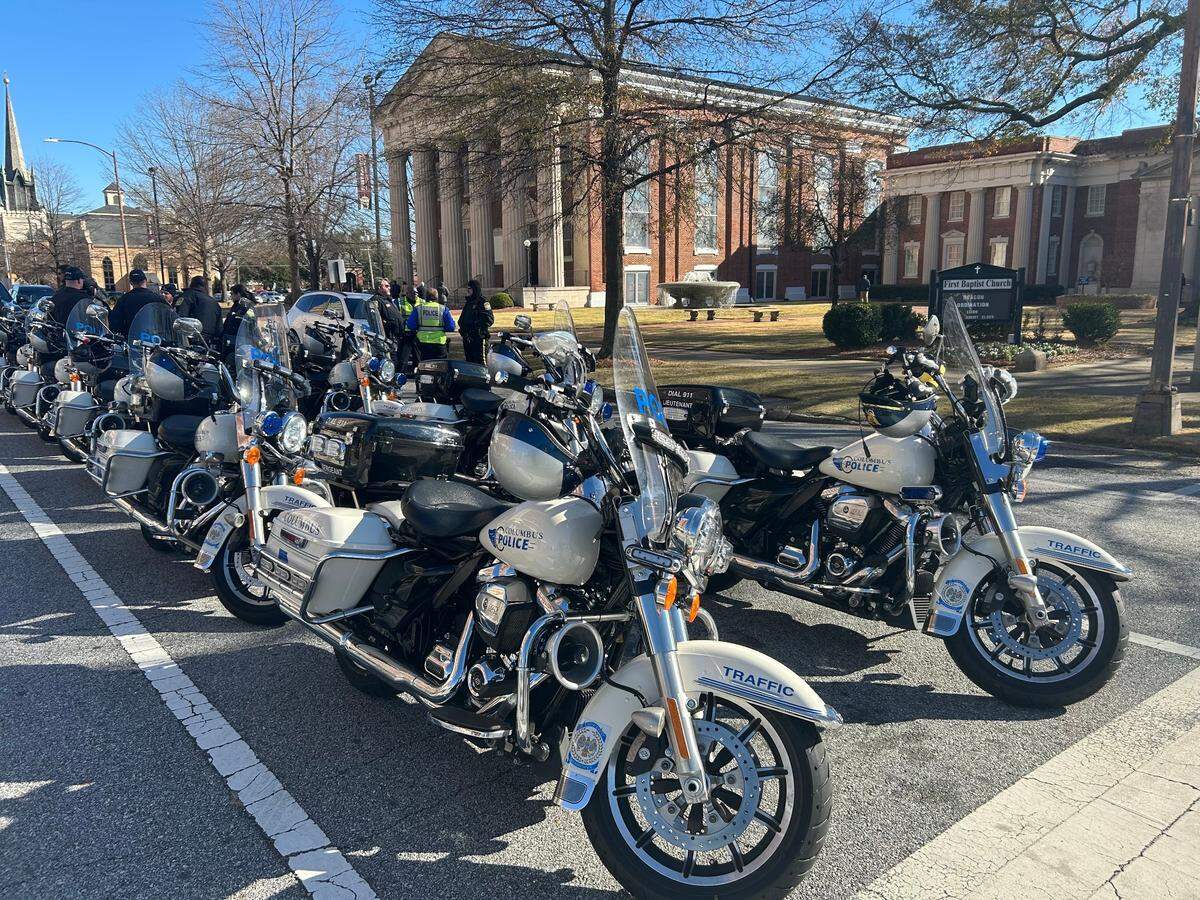 A group of Columbus Police Department Motorcycles line up outside First Baptist Church in downtown Columbus, Ga. prior to Jim Wetherington’s funeral.