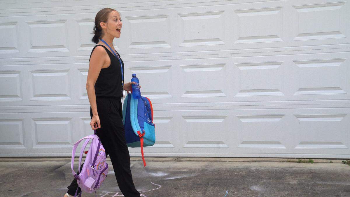 Barbara Skok arrives home after picking up her daughter from elementary school on May 21, 2021, in Columbus, Ga.