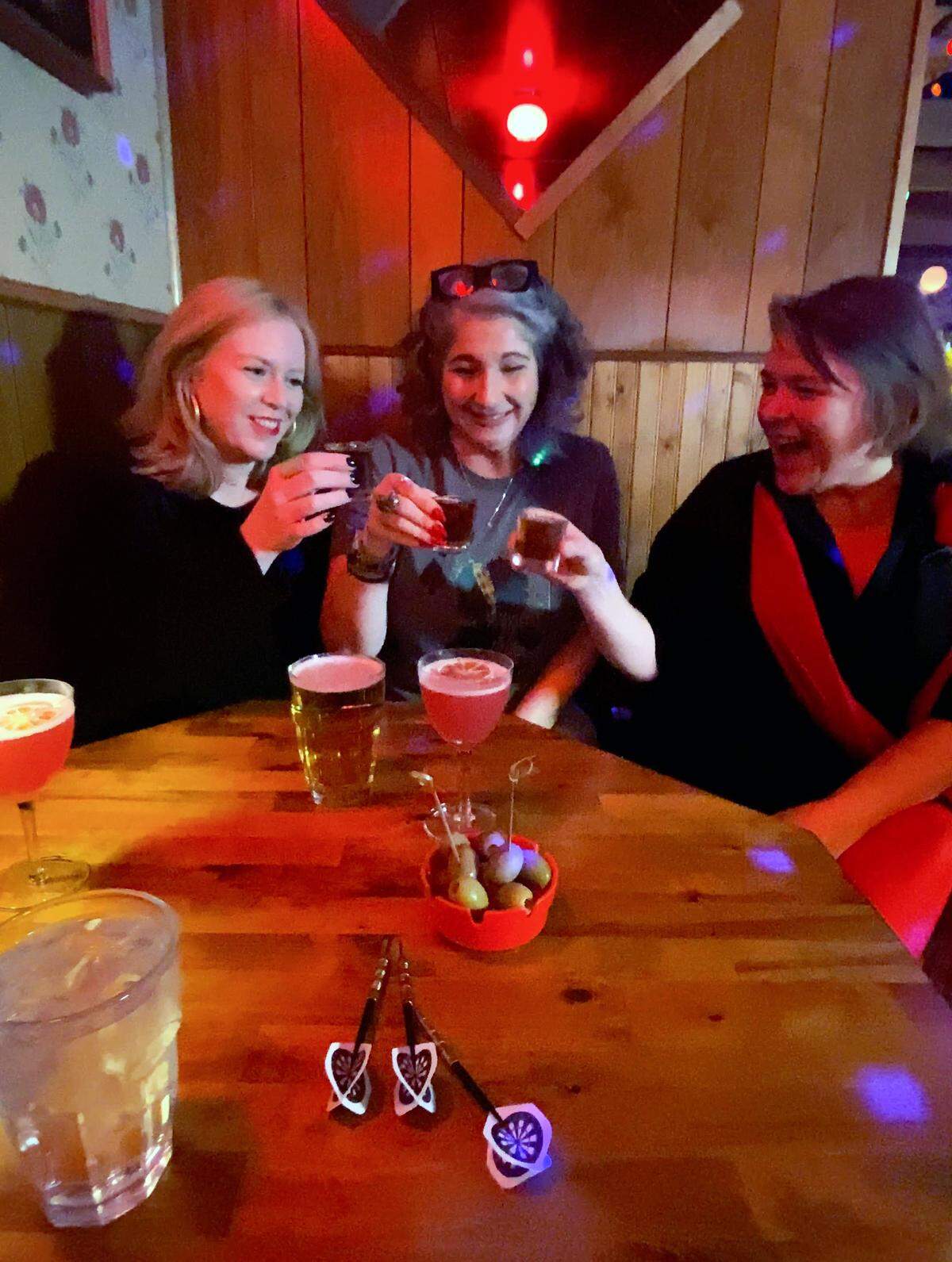 From left, Emilie Menser, Sundi Rose, and Brooke Brantley toast to an early Galentine’s Day celebration at Super Regular, 1239 Broadway in Columbus, Georgia. 02/05/2026