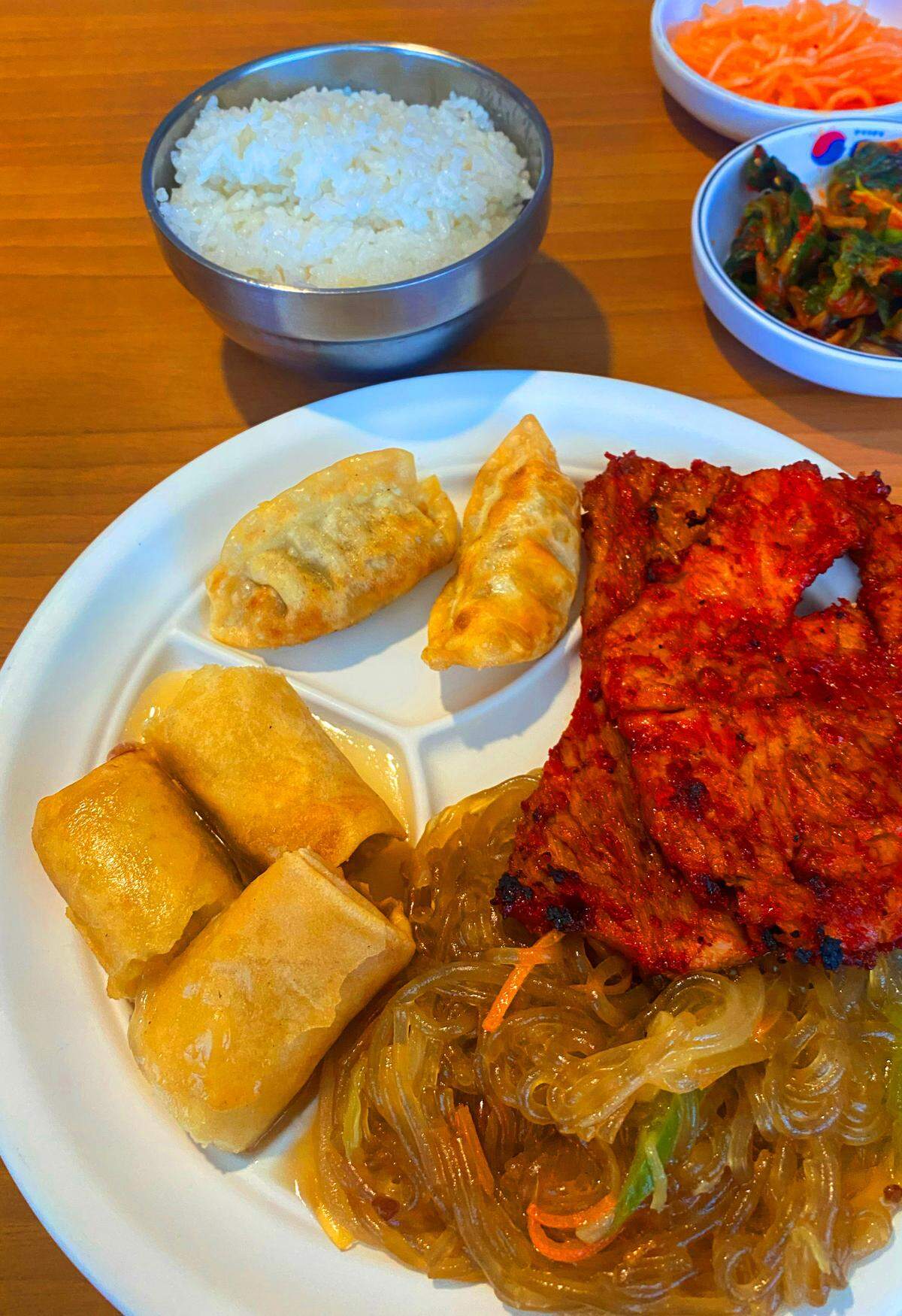Ledger-Enquirer visual journalist orders Lunch Special “B” during a recent trip to Golden Chopsticks restaurant. The Dak Guee (marinated and grilled spicy chicken breast) came with chop chae, spring rolls, yaki mandu and rice. 03/28/2025