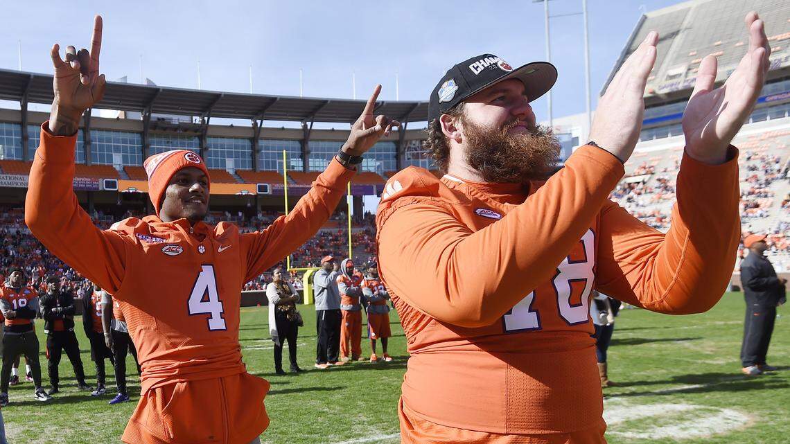 Clemson football quarterback Deshaun Watson, left, and offensive guard Eric Mac Lain celebrate during a pizza party celebrating Selection Sunday at Memorial Stadium, Sunday, Dec. 6, 2015, in Clemson, S.C. (AP Photo/Rainier Ehrhardt)