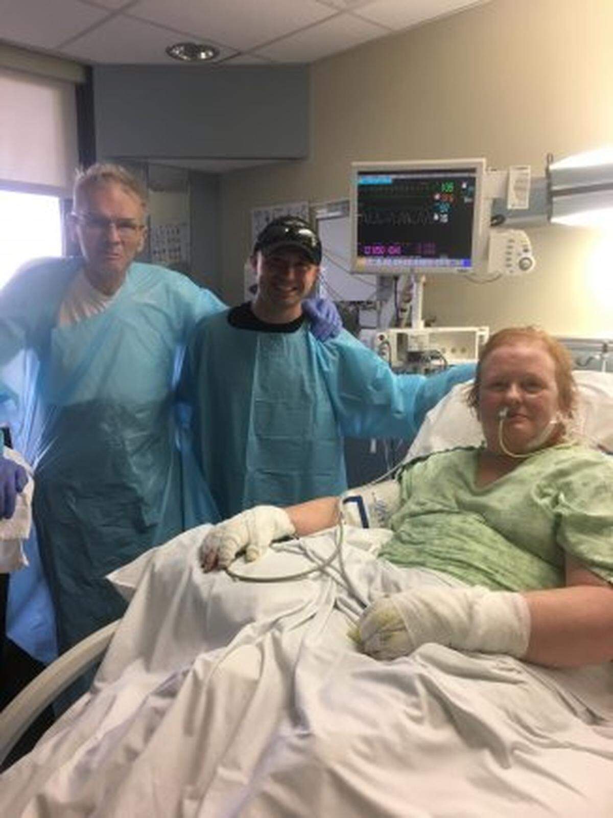 Staff Sgt. Nicholas Davis, C Battery, 1st Battalion, 320th Field Artillery Regiment, 101st Airborne Division (Air Assault) artillery cannon crew member and section chief, visits Rick and Sharon Steiert in the hospital, June 17, 2017, as they recover from a car accident that occurred June 9, 2017.