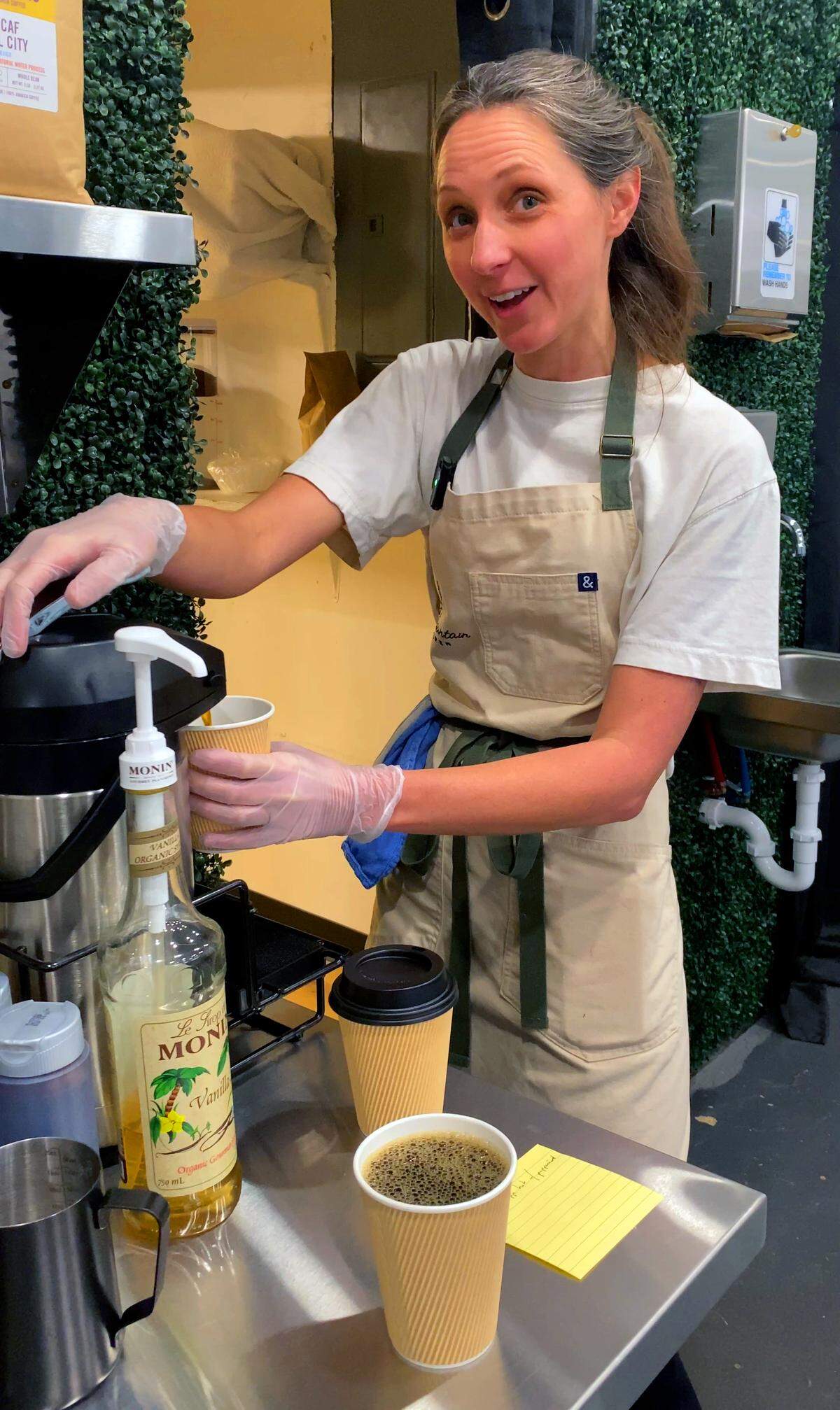 Emily Terbrock, pictured Jan. 16, 2026, prepares a cup of coffee for a customer at Pine Mountain Kitchen in Pine Mountain.