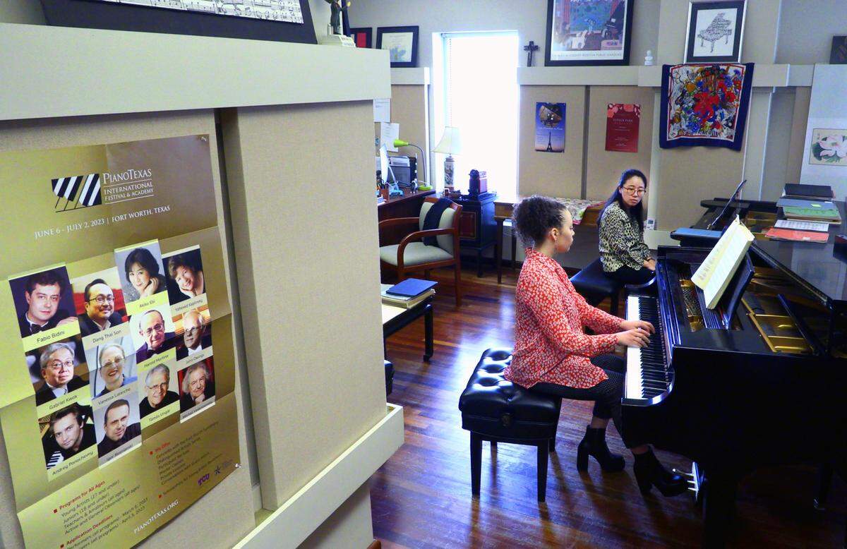 Nikol Bazalytska, left, a student at Columbus State University, plays as Esther Park, associate professor of piano at CSU’s Schwob School of Music, listens. 02/24/2023