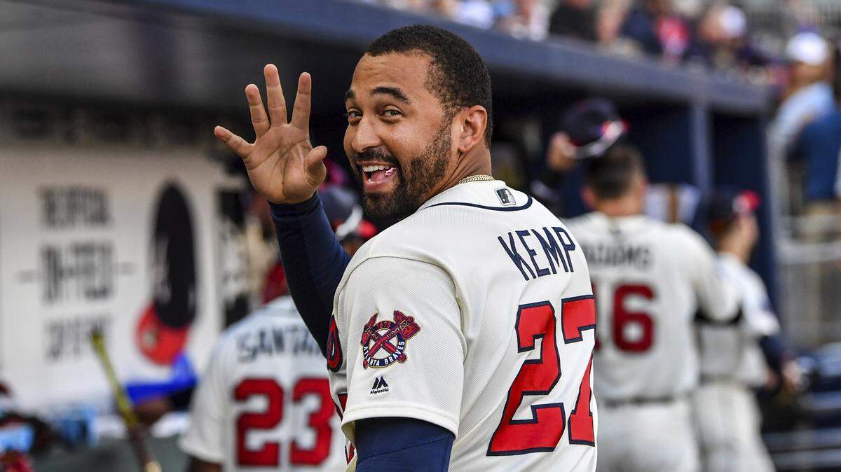 Atlanta Braves' Matt Kemp waves to a fan after a baseball game against the Milwaukee Brewers on Saturday, June 24, 2017, in Atlanta.